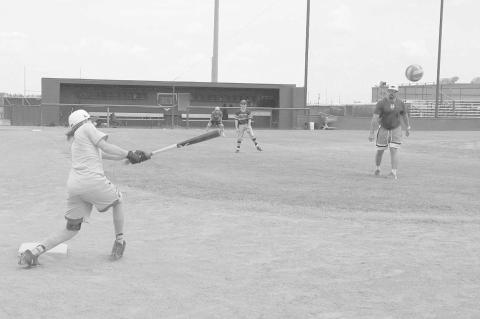 LOBO CAMP- Coach Portwood and Dawson McWilliams practicing for the upcoming season in the early morning of June 30, 2023 at the Levelland High School. (Staff Photo by Aalijah Soliz)