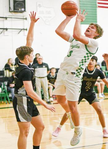 34-POINT NIGHT - Ropes senior forward Kade Franklin puts up a shot in the paint amidst Sudan defenders during their game this past Tuesday night in Ropes. Franklin would end with 34 points on the night. (Staff photo by Jentezen Smith)