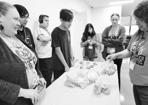 LOC TREATS, NOT TRICKS - The LHS LOC students have been busy this week preparing Treats for Teachers. The kids had to go shop at the store while staying in a budget. They also had to measure and prepare a recipe. Pictured are Mrs. Kristy Scoggins, RJ Bermea, Anthony Moore, Waylon Smith, Trinity Carrillo, Teaching Assistant Avery VanZandt, and Rebecca Gonzalez.(Photo submitted by Cristal Isaacks)