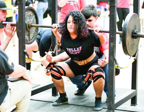 FEEL THE BURN - Levelland’s Nataly Morales does a back squat with perfect depth during the Levelland Invitational powerlifting meet this past Saturday at Levelland High School. (Staff photo by Jentezen Smith)