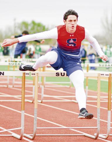 TRAIL LEG PULL THROUGH - Sundown Roughneck Nathan McAdams pulls his trail leg through over the hurdle during the 110-meter hurdles at the Son Qualls Relays this past Friday at Sudan High School. McAdams would run a 15.20. (Staff photo by Jentezen Smith)