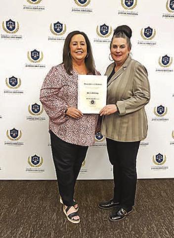 TAC RECOGNITION - Pictured is Hockley County Judge Sharla Baldridge (left) receiving her award which is given to county judges who demonstrate a commitment to judicial excellence by surpassing the state’s minimum education requirements. Judge Baldridge was recognized as a Fellow of the Texas Judicial Academy by the Texas Association of Counties (TAC).