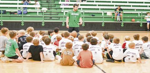 NEXT GENERATION OF EAGLES - Ropes Head Boys Basketball Coach Cameron Copley coaches up his basketball campers during their Tuesday morning session at the Ropes High School gym. The morning session was for second through fifth graders. (Staff photo by Jentezen Smith)