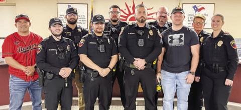 RANK PROMOTION- Levelland PD’s Sgt. Benoit (pictured in the middle) was promoted to sergeant during Monday’s Levelland City Council meeting.Photo courtesy of the LPD)