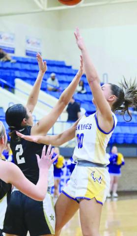 FLOATER - Whiteface Lady Lope Lainey Sanders shot a floater over the Cowgirls defense last Friday night at home to take the District Championship at home. (Photo courtesy of Holly Crutcher)