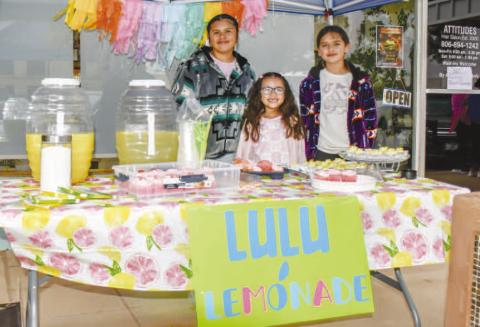 - Pictured from left to right are: Joscelhen Marrufo, Ixtli Sanchez and Jazmin Maruffo who enjoyed serving fresh lemonade for Lemonade Day on Saturday in downtown Levelland. (Staff photo by Hannah Woodrum)
