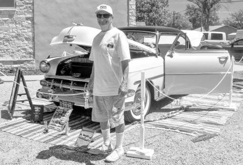 SMYER VFD- The Smyer Voluneteer Fire Department hosted its first fundraiser on Saturday to raise money for a new station. Pictured is Benny “El Chuco” Hernandez from Lubbock that participated in the car show . He is the owner of this 1954 Chevy Bel Air. The engine is a 235 inline 6 125hp and transmission is a 3 speed powerglide. Hernandez said he has won many car shows and enjoys it. (Staff photo by Emily Campos)