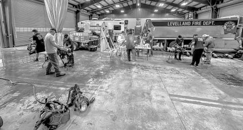 PREVENTATIVE MAINTENANCE - The LFD (Levelland Fire Department) scheduled a mandatory cleaning detail Monday evening to ensure air packs were thoroughly decontaminated. It was stated the cleaning is essential in light of the department's response to multiple fires during the past few weeks. (Photo courtesy of the LFD)