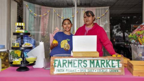 - Pictured are Reyna Morales and Marylee Barrera served their fresh lemonade on Saturdays for Main Streets Lemonade Day. (Staff photo by Hannah Woodrum)