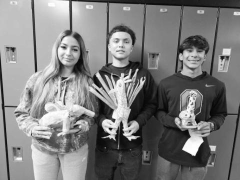 MEXICAN ALEBRIJES- LHS students were caught in Ms. Isabel Navarro's Spanish classes finishing up their Mexican Alebrijes. Pictured are: Janeth Munoz, Landon Orosco, and Javier Ruiz. (Levelland ISD photo)