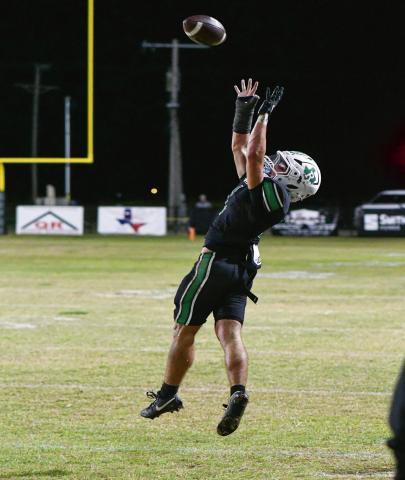 GET UP FOR IT - Ropes junior wide receiver Kolter Dockery jumps up to catch the football during a game against Sundown this past Friday night at Ropes Eagle Stadium. Dockery would end with two catches for 40 yards. (Staff photo by Jentezen Smith)