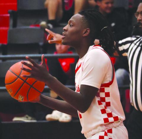 Levelland Lobo Elijah Jordan inbounded the ball during the teams contest against the Brownfield Cubs last Tuesday. (Staff photo by Aalijah Soliz)