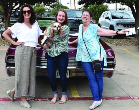 WILDCATS– Thunder on the Plains Poker Run had some wildcats on the loose Friday evening. Pictured from the left are Iris Keeling and her daughter, Alycyn Keeling with her companion, Abygail and Beth Walls, all of Levelland, heading out for the annual Poker Run and Cruise in a 1966 Wildcat GS. Iris is the owner of the 1966 Wildcat, which is one of only 200 made. (Staff Photo)