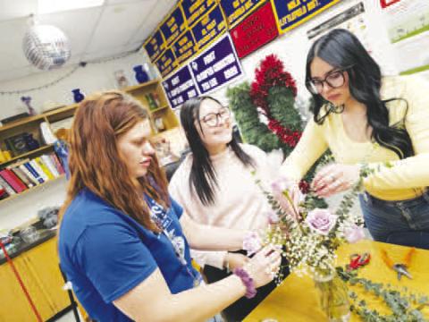 VALENTINE’S ARRANGEMENTS --LHS Floral Design classes were hard at work last week, practicing their flower-arranging skills as they created Valentine’s arrangements. Students showcased their creativity, technique, and sense of symmetry as they applied what they’ve learned in Mrs. Tori Henderson Williams’ class. Each arrangement required careful attention to balance and to complementary and analogous color schemes. (Levelland ISD photo)
