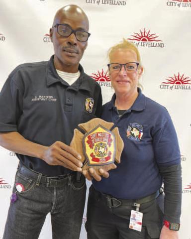 JOB WELL DONE - The LFD held an awards banquet on Saturday with Curt Masters (left) being honored for his 30 years of service. Pictured alongside Masters is Interim Fire Chief Patty Byars-Faulkner. (Photo courtesy of the LFD)