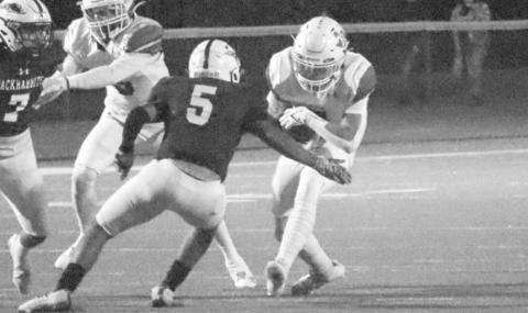 OUT OF MY WAY - Ropes running back Bregg Feldman ran over a Ralls defender in the teams loss in Abernathy last Thursday. (Staff photo by Aalijah Soliz)