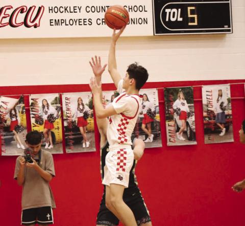 Levelland Lobo Anthony Gonzales shot the ball during the teams game against the Jayton Jaybirds for some much needed points. (Staff photo by Aalijah Soliz)