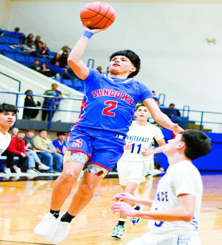 FLOATER GAME - Sundown's Marco Landa shoots a floater this past Tuesday at Whiteface High School.