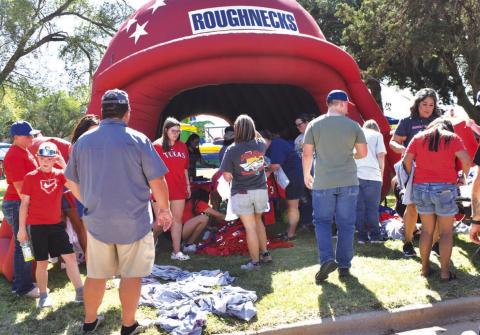 ROUGHNECK T-SHIRTS- The Sundown ISD Booster Club participated in the Oil Patch Day event on Saturday at the Sundown City Park. The group sold Sundown t-shirts to help raise money, to promote and support school programs and student interest groups. (Staff photo by Emily Campos)