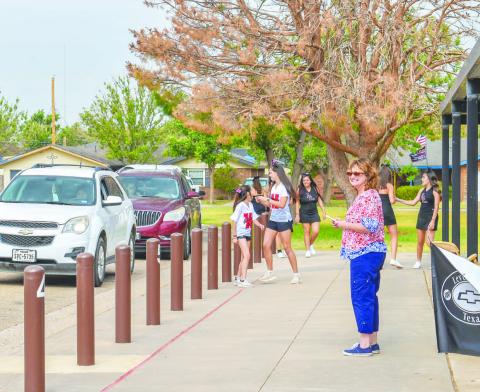 BACKPACK GIVEAWAY- The Hockley County Voices Colalition Back-to-School Backpack Giveaway was held on Saturday at Capitol Elementary. Donations were giving by Levelland Chevrolete, Buick and GMC, Hockley County Credit Union and Renegade. The event assists students with school supplies. (Photo courtesy of Emily Campos)