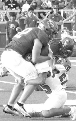 BACKFIELD PLAY- Johnny Acevedo made a big tackle in the backfield during the game against Farwell. The Roughnecks fell to Farwell, 49-0. Sundown will welcome Wink into for homecoming Friday September 16. Kick is scheduled for 7:30 p.m. (Photo Courtesy of Chris Bratcher)
