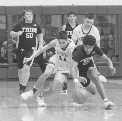 LOOSE BALL - Whiteface Antelope Cesar Chavez and Morton Indian Brayden Villarreal both dove to get to the loose ball during the team’s game against each other last Friday. (Photo courtesy of Holly Crutcher)