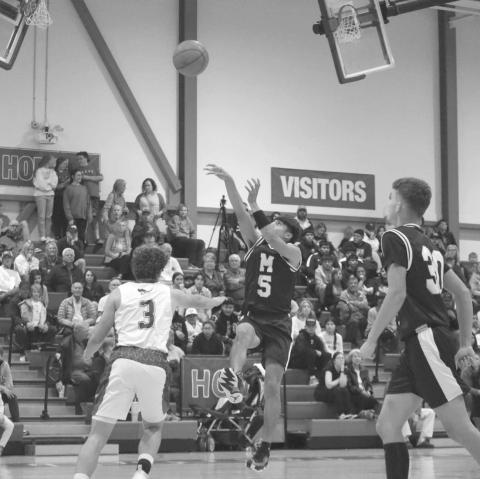 FADEAWAY - Morton Indian Alex Lopez shot a contested fade away during the teams contest this past Monday night in the teams loss to All-Saint. (Staff photo by Aalijah Soliz)