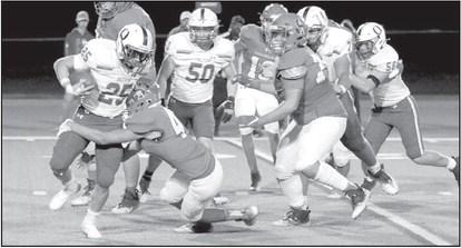 NO YARDS GAINED- Noah Peralez makes a tackle behind the line of scrimmage. Sundown earned their first district win of the season with a 49-32 victory over Olton. The Roughnecks moved to 1-1 in District play and will travel to New Deal Friday, October 21st to face a 2-0 Lions squad. (Photo Courtesy of Chris Bratcher)