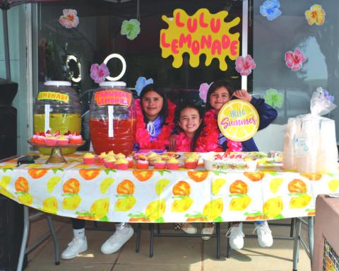 LULU LEMONADE- On Saturday, Lulu Lemonade participated in Lemonade Day even on the square . Pictured in no particular order are: Jocelhyn Marrufo and Jazmin Marrufo who play youth softball and Ixtli Sanchez who dances for the Levelland Dance Studio. (Staff photo by Emily Campos)
