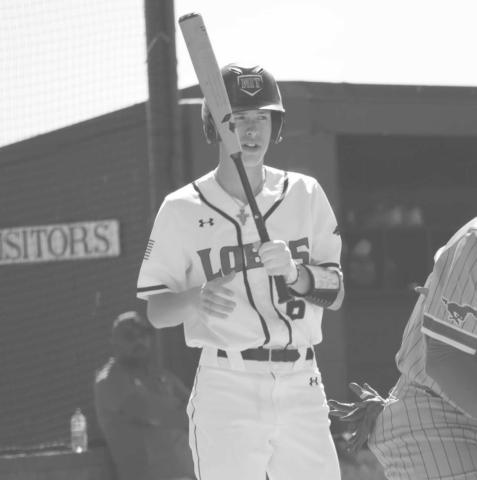 TAKE A BREATHER - Levelland Lobo Anson Mcmahan took a breather before his at bat during their last matchup last Tuesday against the Denver City Mustangs. (Staff photo by Aalijah Soliz)