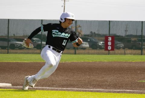 ROUNDING THIRD BASE - Ropes Eagle Zach Ramirez rounds third base during their district baseball against the Sundown Roughnecks this past Friday at Sundown High School. (Staff photo by Eric Venkatesan)