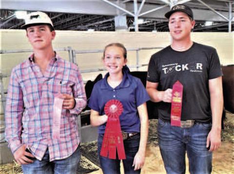 STATE FAIR WINNERS-- Hockley County 4-H members had a good day on Thursday at the State Fair of Texas. Copper Popelka placed 2nd, Shorthorn, Class 3, Heavyweight British; Kynlee Mae Thomas, 2nd, Exotic, Class 10, Lightweight Black &amp;amp; Red Cross; and Colt Parkinson placed 4th, Shorthorn, Class 1, Lightweight British. (Submitted photo)