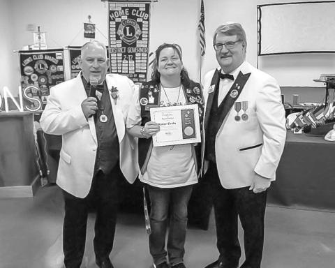 HONOR BEFITTING A LION - On Saturday May 10, Katie Ervin of the Levelland Evening Lions Club was honored with the fourth highest award that can be given to a Lion. A certificate of Appreciation: in recognition of distinguished achievements in Fulfilling the Mission of Lions Club International, signed from the International President of Fabricio Oliveira (2024-2025). Pictured from left to right at the presentation are: Jake Bentley District Governor for District 2T2 (2024-2025), Katie Ervin Secretary/Treasur