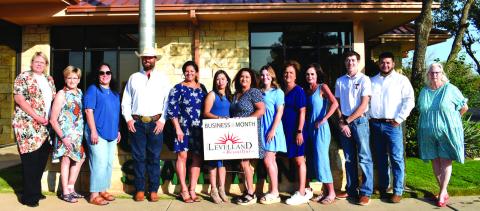 JULY BUISINESS OF THE MONTH - Sundown State Bank was selected for the Businesss of the Month award for July. The monthly contest is held by the Chamber of Commerce and Keep Levelland Beautiful Program. Pictured from left to right is: Kelly Hancock, Barbra Pinner, Janie Morales, Chad Currington, Lisa Delgado, Tiffany Torres, Roberta Garza, Ella McCormick, Kim Smith, Christi Spruiell, Mark Buxkemper, Jonathon Sainz and Donna Wheeler. Not pictured is Kirk Alexander. (Photo courtesy of Emily Campos)