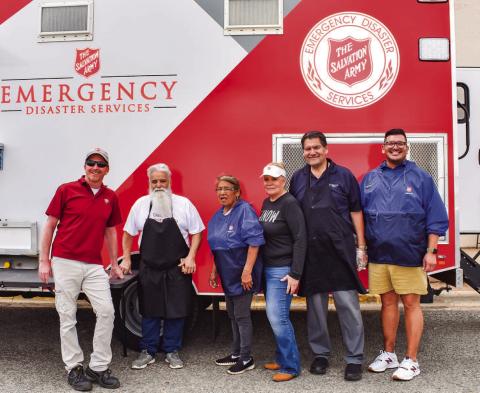 NATIONAL SALVATION ARMY WEEK - In celebration and recognition for National Salvation Army Week, a mobile food truck was held at 502 Avenue H in Levelland which provided free food from 11 a.m. to 1 p.m. Pictured from left to right are: Major David Worthy, Joel Garza, Maria Zamora, Susie Zapata, Jesse Zapata and Special Events Coordinator Albert Zapata. (Staff photo by Emily Campos)