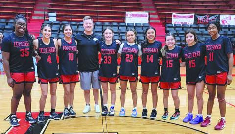 LOBOETTE JV RED- Levelland Head Coach Clay Barnett hosted the Annual Meet the Loboettes last week at Levelland High School. Coach Barnett had the girls display their skills before a friendly competition against parents. Pictured in no particular order are: Emily Perez, Mia Morin, Delaney Delgado, Kaydence Escarcega, Kaylee Penner, Heaven Morin, Tanaesia Brackens, Sydnii Joyce, Presley Smith and coach Nathan Riggan. (Photo Courtesy of Cristal Isaacks)