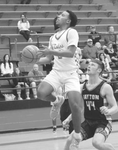 LAY UP - Levelland Lobo Jayden Castillo broke off for a Levelland fast-break to get the team some much needed points throughout the game. Castillo led the team in scoring by getting them 22 points in the teams loss against Jayton. (Staff photo by Aalijah Soliz)