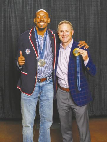 DISTINGUISHED ALUMNI AWARD WINNER - Vernon Norwood (left), gold medalist in the men’s 4x400-meter relay during the 2024 Summer Olympics, received the South Plains College Distinguished Alumni Award during the college’s annual Scholarship Banquet on Nov. 7 at the Mallet Event Center in Levelland. Former SPC Assistant Track and Field Coach Blaine Wiley (right) was among the attendees who celebrated Norwood. (SPC Photo)