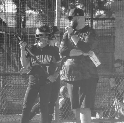 CONFIDENCE - Levelland Loboette Saydi Mendez talked with Head Softball Coach Ryan Miller during the team’s game against Plainview this past Tuesday at home. (Staff photo by Aalijah Soliz)