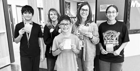 READING PAYS OFF - LMS Librarian Mixie Cloweawarded five students with gift cards for exceeding in the BeanStack Reading Program. Eddie Palomino, Myrcea Barber (not pictured), and Brian Ramirez were awarded gift cards for earning the most badges. Rose Whitmire earned the Best Book Reviews gift card. Jocelyn Arriaga's was the LMS Reader drawn from all the names of those who participated in reading the first nine weeks. (Photo courtesy of Levelland ISD)