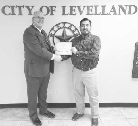 ECONOMIC EXELLENCE RECOGNITION - The Levelland Economic Development Corporation (LEDC) was a recipient of the 2024 Economic Excellence Recognition award during the 2025 Texas Economic Development Council (TEDC) Winter Conference, Feb. 28. Pictured is Levelland City Manager James Fisher and LEDC Director Justin Balderas. (Staff photo by Dom Puente)