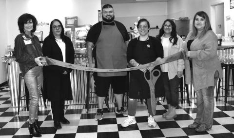 LOBO DEN RIBBON CUTTING - The Levelland Chamber of Commerce hosted a ribbon cutting to celebrate the grand opening of the Lobo Den located at 219 Cactus. Pictured from left to right are: Cristal Issacks, Janie Mireles, Derick Oavtbort, Owner Janie Oravtbort, Tiffany Olivares and Stephanie Rodriguez (Staff photo by Emily Campos)