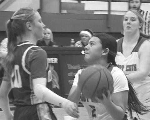 - Dyamon Baker had five points for the Smyer Lady Cats in a 57-43 loss to the visiting Olton Lady Mustangs in UIL high school girls’ basketball action last Friday. The Lady Cats will be in Lubbock at the Caprock Classic Basketball Tournament on December 28-30. (Photo by Jay Kelley)