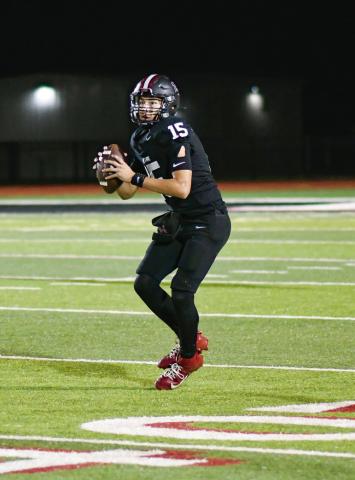 - Levelland starting quarterback scans the field to try and find an open man during a football game against Estacado this past Friday at Lobo Stadium. (Staff photo by Jentezen Smith)
