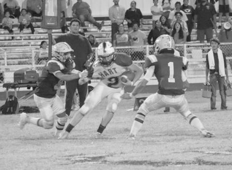 FLYING TO THE BALL - The Anton Bulldog defense was making plays all around the field, making the Hart Longhorns offense work for their yards. The Bulldogs started district play this Friday against the Kress Kangaroos as the away team. (Staff photo by Aalijah Soliz)