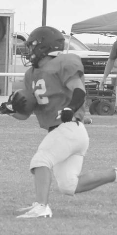 OPEN FIELD- Whitharral’s Dawson Rodgers made a good open field run against the Lubbock Home School Titans in the first scrimmage of the season last Friday in Whitharral. The Panthers will be in Petersburg for the final tune up on Friday at 5 p.m. (Photo Courtesy of Jay Kelley)