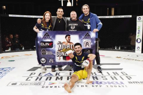 TEAM MIGHTY – Mateo Gonzalez and his team pose for a photo following his 3rd round KO victory against Darrius Jackson at PFC 39 on October 19, 2024. (Photo Courtesy of Mateo Gonzalez)