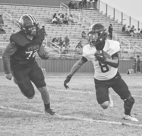 TOO FAST - Levelland Lobo Ricky Rodriguez outran the defensive lineman last Friday in the team’s contest against the Brownfield Cubs on the road. (Staff photo by Aalijah Soliz)