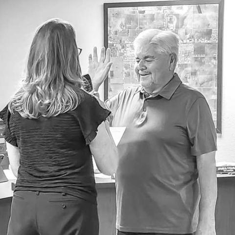 COUNCIL MEMBER DISTRICT B - Levelland City Councilman Max Ledesma underwent an Oath of Office which was administered by the City Secretary Andrea Corley during Monday evening's regular council meeting. Ledesma ran unopposed in the May general election. (Staff photo by Dom Puente)