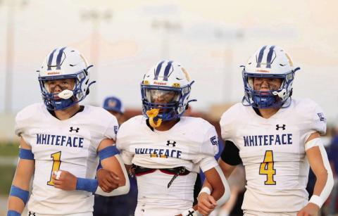 TEAM CAPTAINS - Whiteface Antelopes football team captains pictured from left to right sophomore Luke Gresham, senior Victor Borunda and junior Jaxon Hodge stand together before the coin toss for their game against Klondike this past Friday night. (Photo provided by Whiteface Victory Line Facebook)